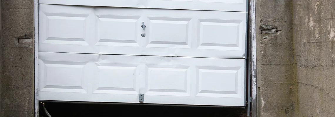 Garage Door Got Hit By A Car Dent Removal in Pickering, ON