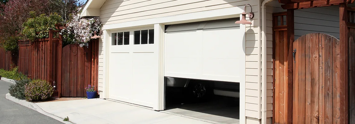 Fix Metal Garage Door Jerking in Pickering, Ontario